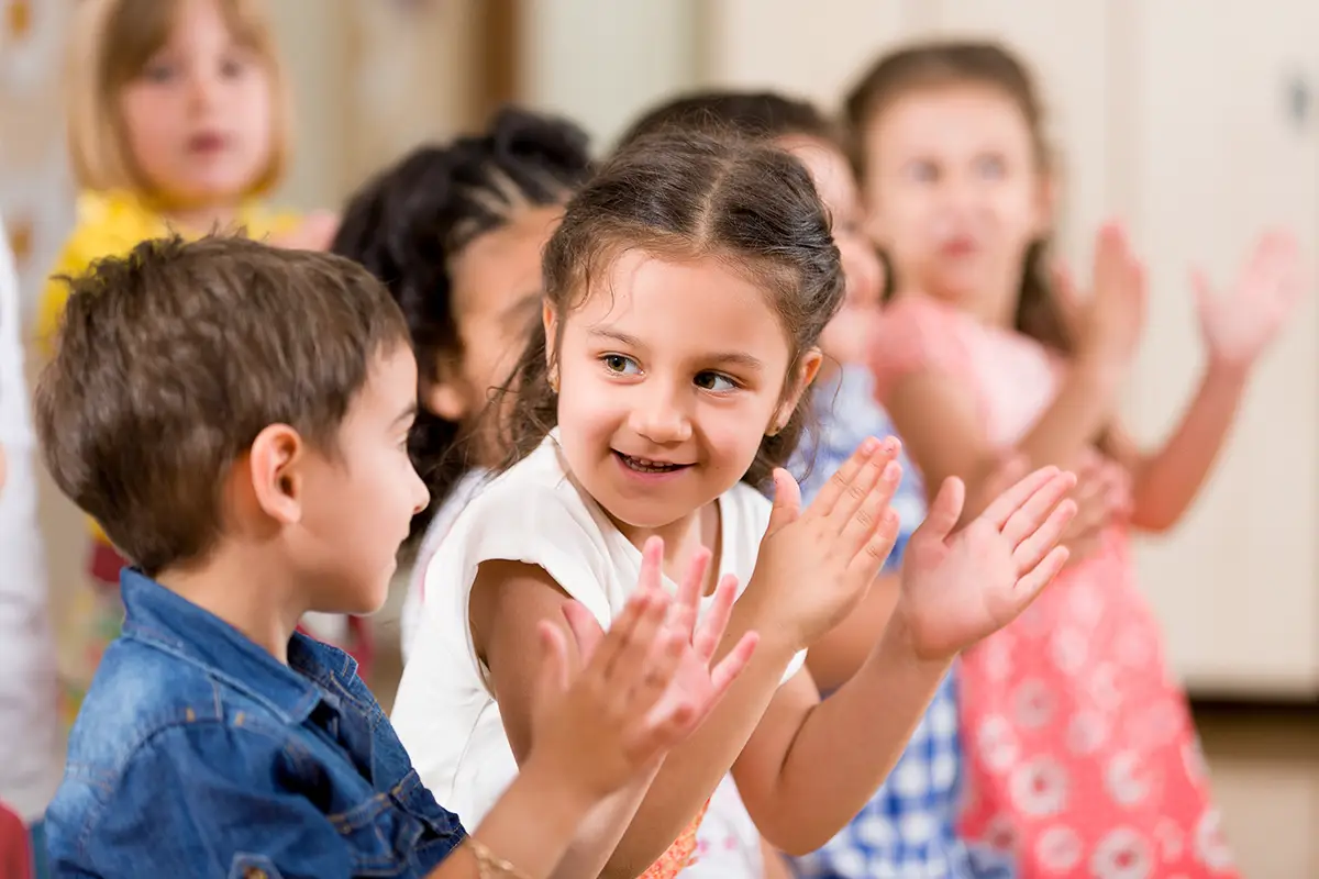 Photo of kids clapping